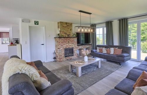 Trou de Bra House | Ardennes group house with fireplace and garden