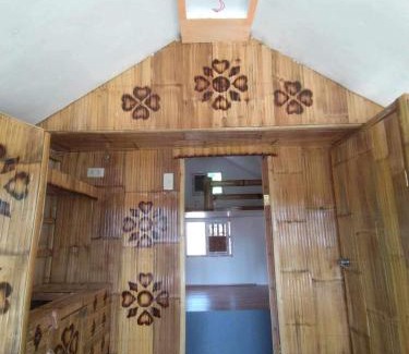 San Juan Bed & Breakfast | Aremen Transient, Nipa Hut with shared main houses bathroom