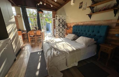 Nacoes House | Arthi - LINDO LOFT RECANTO DOS PASSARINHOS com HIDROMASSAGEM!