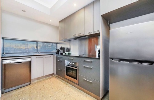 Darwin City Centre Apartment | Artistic City Escape with Balcony and Parking