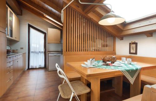 Ragoli Apartment | Attico Abbraccio di Luce