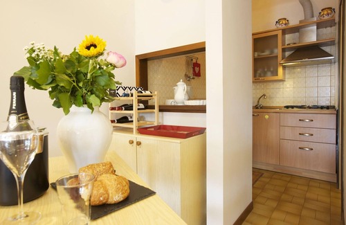 Susello Apartment | Attractive studio with balcony, pool and dream view