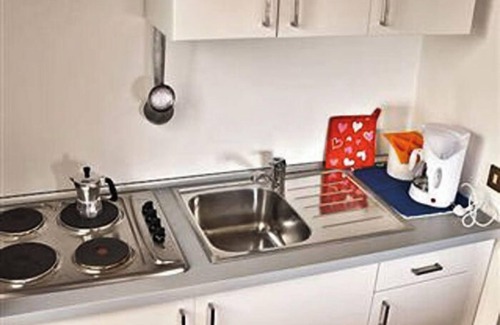 Susello Apartment | Attractive studio with terrace and garden, pool and dream view
