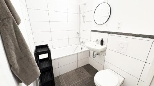 Stadtbezirk West Apartment | Ausgestattete Wohnungen für Monteur-Teams mit kostenlosem Parkplatz, WIFI, TV, Waschmaschine, Küche, Balkon, Restaurants und Supermarkt