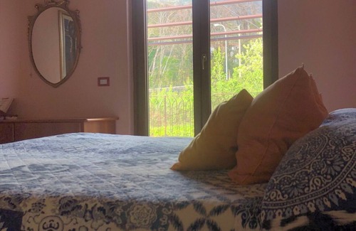 Ogliara Bed & Breakfast | B&B La Rosa: cozy attic room with terraces and spacious living room