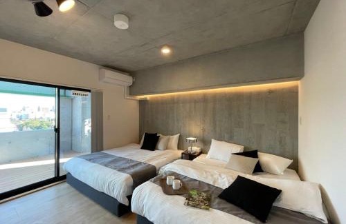 Hiroshima City Centre Apartment | b hotel Nekoyard - Scenic Penthouse Studio with Jacuzzi & Spacious Terrace