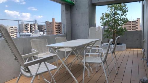 Hiroshima City Centre Apartment | b hotel Nekoyard - Scenic Penthouse Studio with Jacuzzi & Spacious Terrace