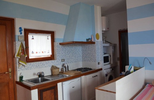 Bagnaia Apartment | Bagnaia, Elba island 50 meters from the beach, lovely with sea view.