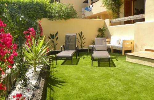 Puerto Rey Apartment | Bahia Marinas - Tu hogar con jardín privado!