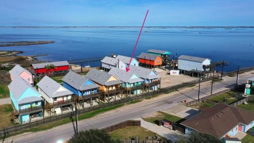 Flour Bluff House | Balcony w Bay View Shared Pool Boat Dock Fat Flounder by AvantStay