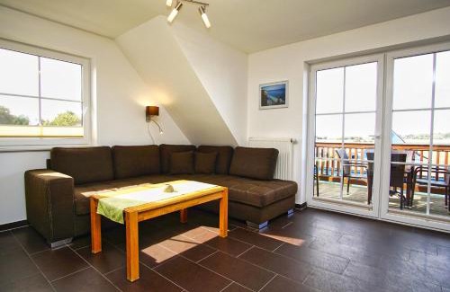 Thiessow Apartment | Balkon mit Meerblick, gratis Nutzung vom AHOI Erlebnisbad und Sauna in Sellin - Haus De niege Wech FeWo 03