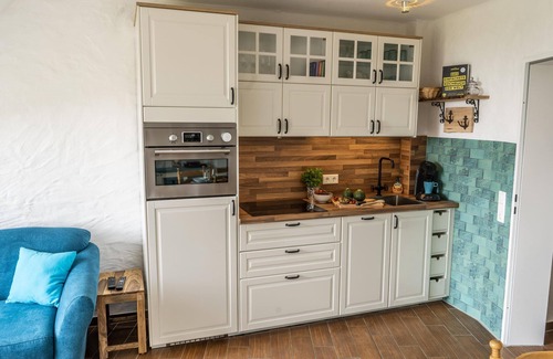 Kronsgaard Apartment | Baltic Sea view - 1st floor, balcony, shower, washing machine, swimming pool, infrared cabin