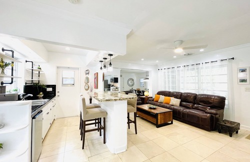 Dolphin Isles House | Bamboo House, Heated pool, Steps from the beach.