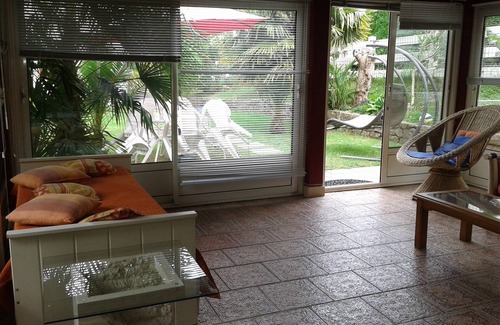 Bayonne House | Bayonne calm and relaxation by the heated swimming pool in lush greenery