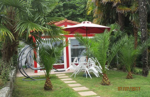 Bayonne House | Bayonne calm and relaxation by the heated swimming pool in lush greenery