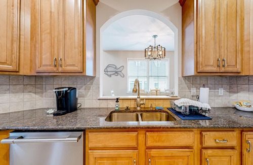 The Commons House | Bayside Resort home with Ping-Pong, sunroom, pool, gym, & hot tub access