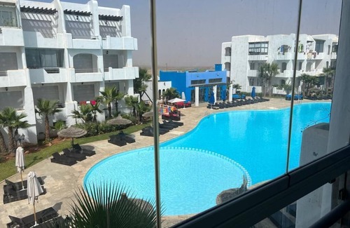 El Mansouria Apartment | Beach apartment with sea view and swimming pool