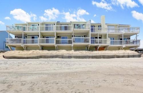 Kure Beach Apartment | Beach Blanket - Spacious condo with Private beach access and resort amenities! condo