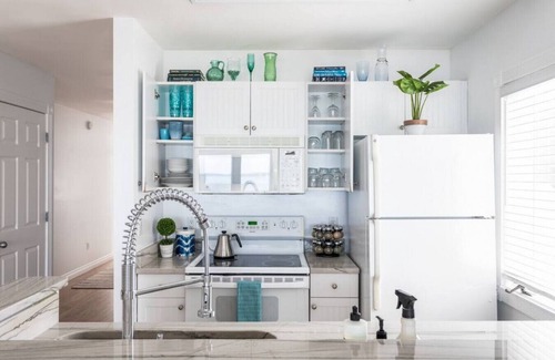 Traverse City Condo | Beach Bliss 211 Balcony Water Views Beach Downtown