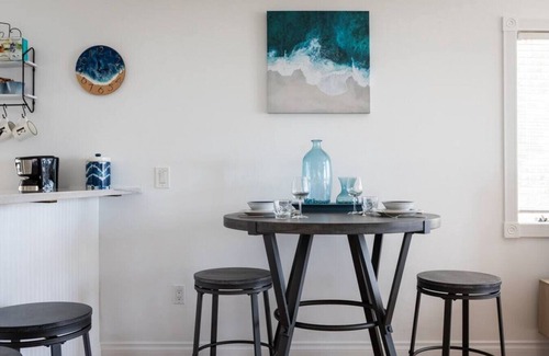 Traverse City Condo | Beach Bliss 211 Balcony Water Views Beach Downtown
