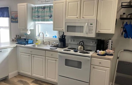 Momauguin Apartment | Beach-Farm Backyard Oasis with Goats, Gardens, Games and FREE Beach Club Passes!