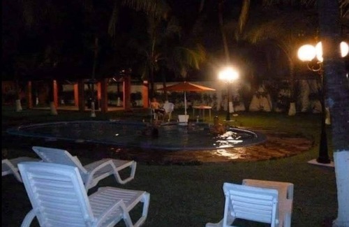 Playa El Pimental House | Beach from house, 3 rooms with air conditioners, 43 coconut trees, 7 hammocks