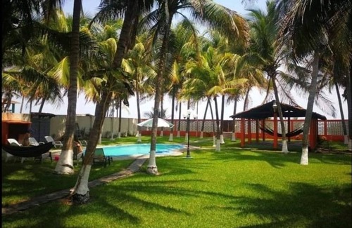 Playa El Pimental House | Beach from house, 3 rooms with air conditioners, 43 coconut trees, 7 hammocks