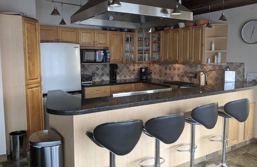 Port Moody House | Beach Home waterfront home with dock.