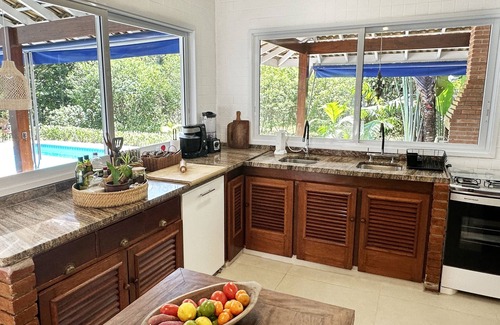 Costa do Sol House | Beach house with heated pool in seaside condominium