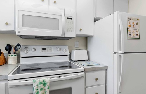 Avon By The Sea Condo | Beachfront 2BR Condo with Pool BBQ & Steps To Beach!