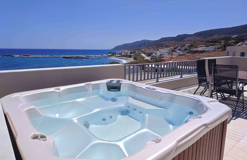 Agia Pelagia Apartment | Beachfront Ela Luxury Stay with Jacuzzi & Views