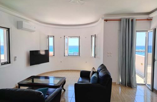 Agia Pelagia Apartment | Beachfront Ela Luxury Stay with Jacuzzi & Views