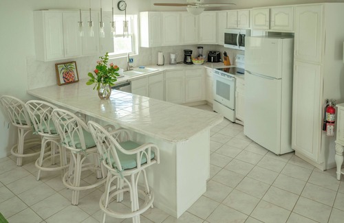 Blossom Village Villa | Beachfront Two-Bedroom Villa- Wake up to the sound of the waves