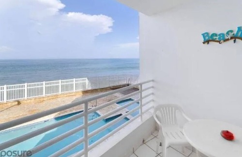Stella Condo | Beachfront unit with sweeping views of the sea and pool! Family/pet friendly!