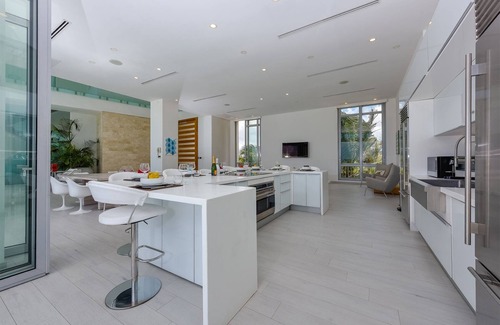 Savaneta House | Beachfront Villa Infinity Pool, Gym, Media room. 6 Bedrooms 7 baths. Sleeps 13