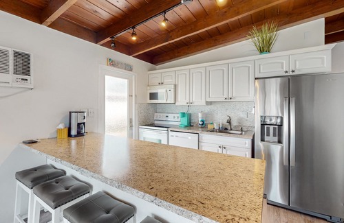 Key Colony Beach Cottage | Beachy getaway with pool, water views, furnished patio, & dock access