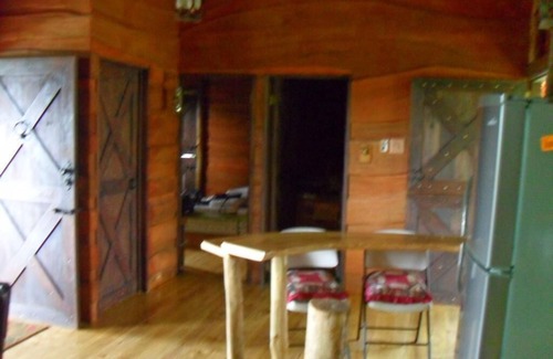 San Isidro de El General Cabin | Beautiful Log Cabin in Tinamaste with stunning views of waterfall and forest