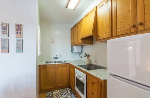 Arenal d'en Castell Apartment | Beautiful Apartment with Wi-Fi, Pool, Terrace and Sea View