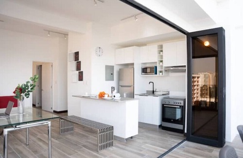 Colonia Bella Aurora Apartment | Beautiful Apt-Airport, Pizza Oven, Grill, Below