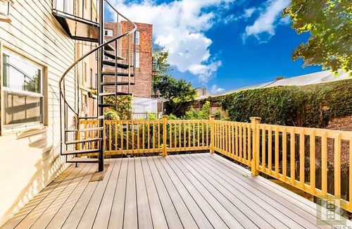 Concourse Apartment | Beautiful an spacious two bedroom complete apartment with deck and patio.