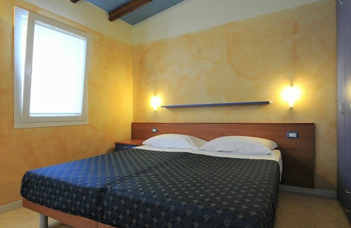 Lido di Pomposa Apartment | Beautiful apartment for 4 guests with pool, WIFI, A/C, TV and parking