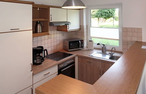 Ditzumerverlaat House | Beautiful apartment in villa for 8 guests with WIFI, TV, terrace and pets allowed