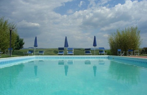 Peccioli Villa | Beautiful apartment in villa for 3 guests with pool, WIFI, panoramic view and parking