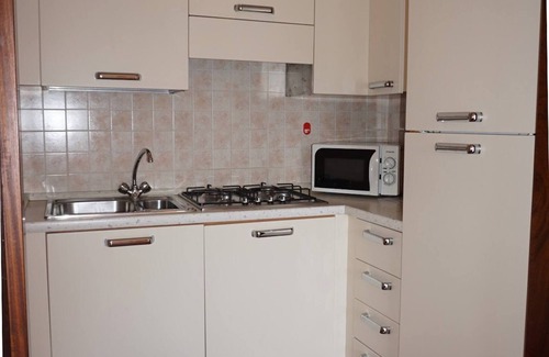 Porto Santa Margherita Apartment | Beautiful beach apartment with shared swimming pool