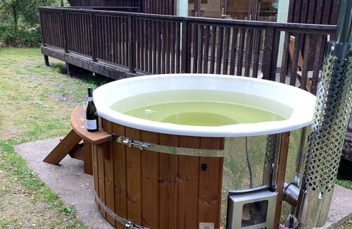Dallavich Cabin | Beautiful cabin with log burner, wood fired hot tub and stunning views.