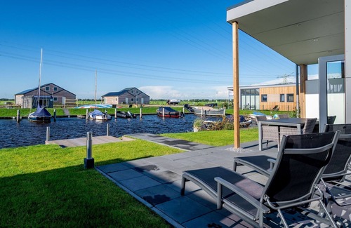 Akkrum House | Beautiful chalet with a jetty, near Frisian lakes
