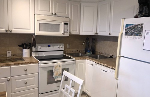 Fort Pierce Condo | Beautiful Clean Condo, private veranda, steps from private beach and pool