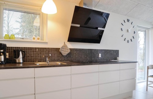 Brande House | Beautiful cottage in a unique location right by the river Skjern Å with good fishing grounds.