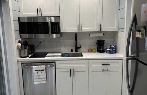 Maple City Condo | Beautiful & cozy condo with private wooded view deck @ The Homestead Resort