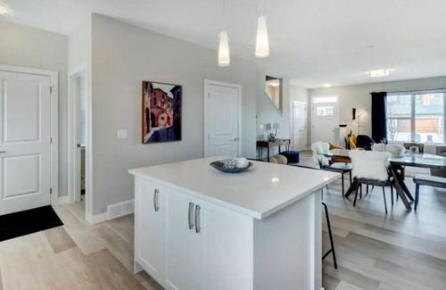 Cochrane House | Beautiful Executive Townhome